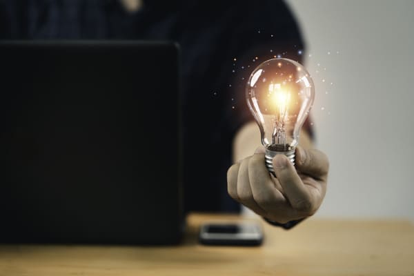 businessman-hand-holding-lightbulb-with-glowing-light-creative-smart-thinking-inspiration-innovation-with-network-concept.jpg